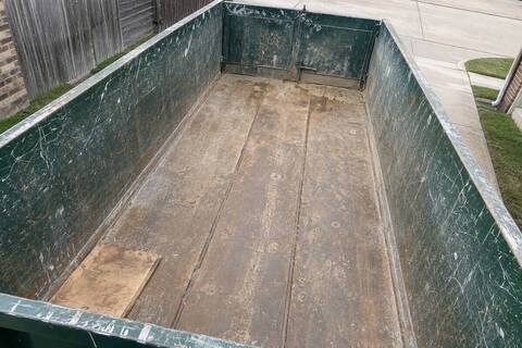 Empty roll-off container seen from above